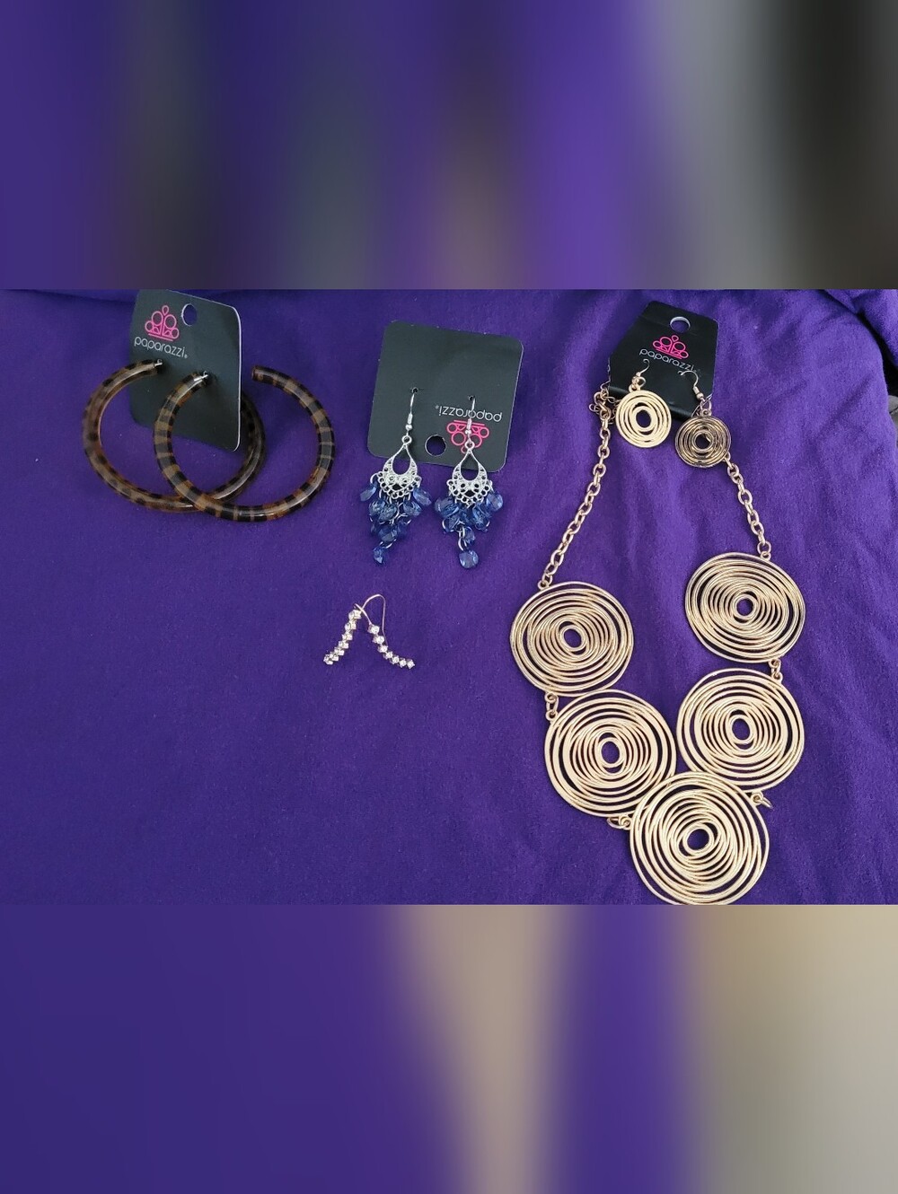 4 separate pieces of Paparazzi jewelry.
